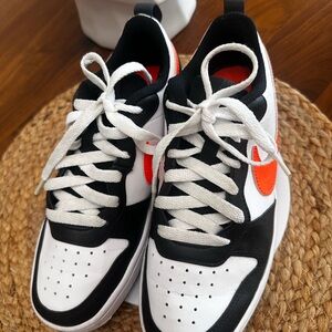 Nike Black and White Sneakers with Orange Accents